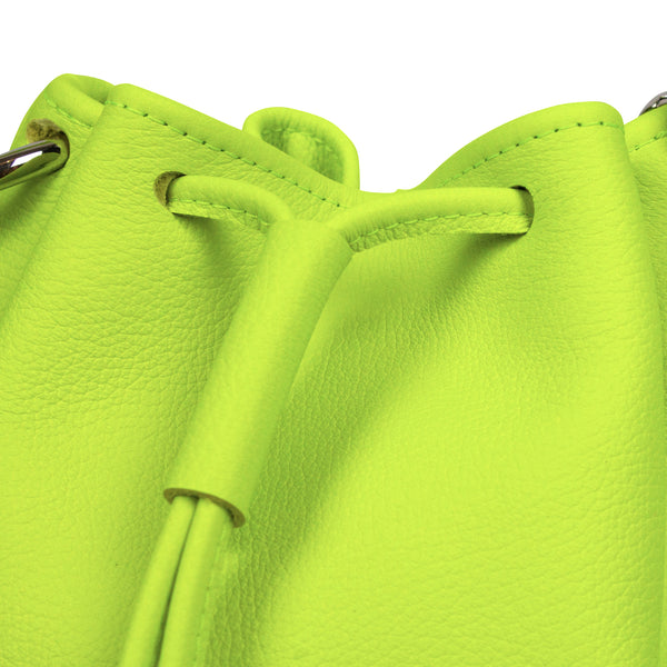 Leather bucket bag in yellow neon on a white background